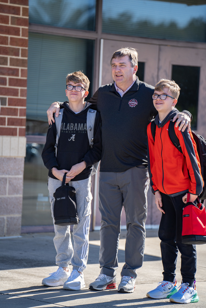 Kirby Smart takes pictures with Bartow County students